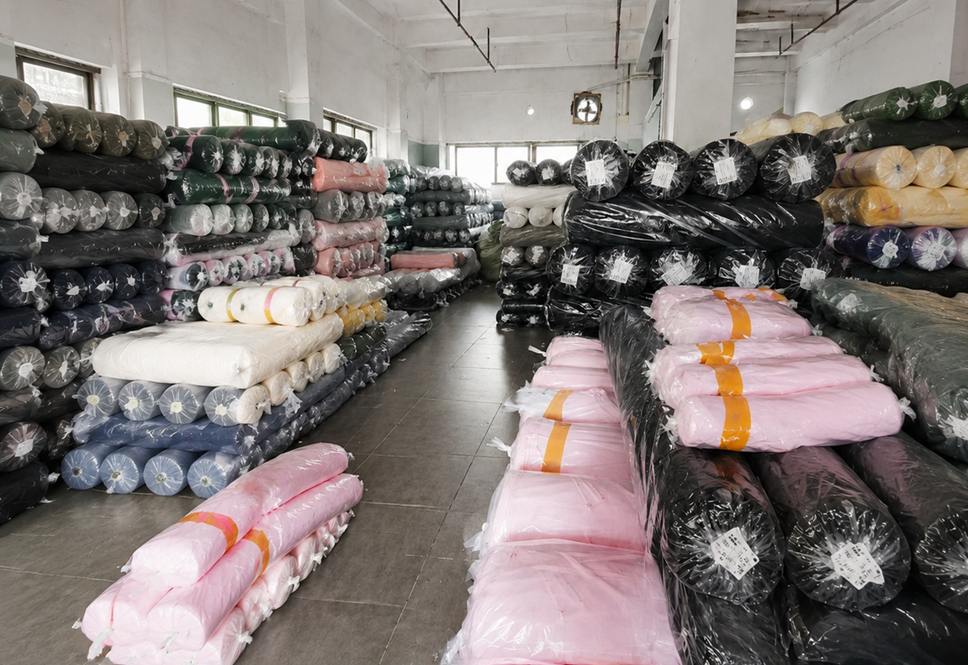 Fabric sourcing and review for custom clothing production